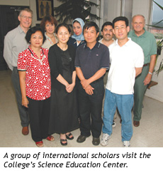 A group of international scholars visit the College’s Science Education Center.