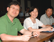 Korean educators engage in research workshops. 