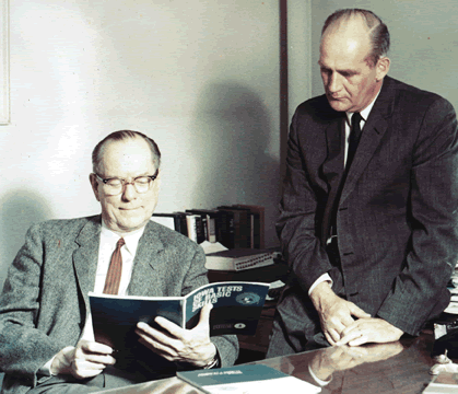 E.F. Lindquist (L) and Al Hieronymus examine the newly published Iowa Test form, 1964.