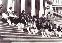 1974 Old Gold Singers perform on the steps of the Old Capitol. 