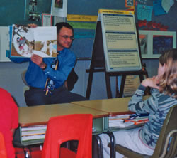Wise reads to his students.