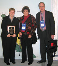 Hildebrandt with UI Professors Leslie Schrier and Michael Everson.