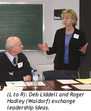 (L to R): Deb Liddell and Roger Hadley (Waldorf) exchange leadership ideas.
