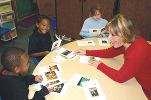 Bell reads with her students.